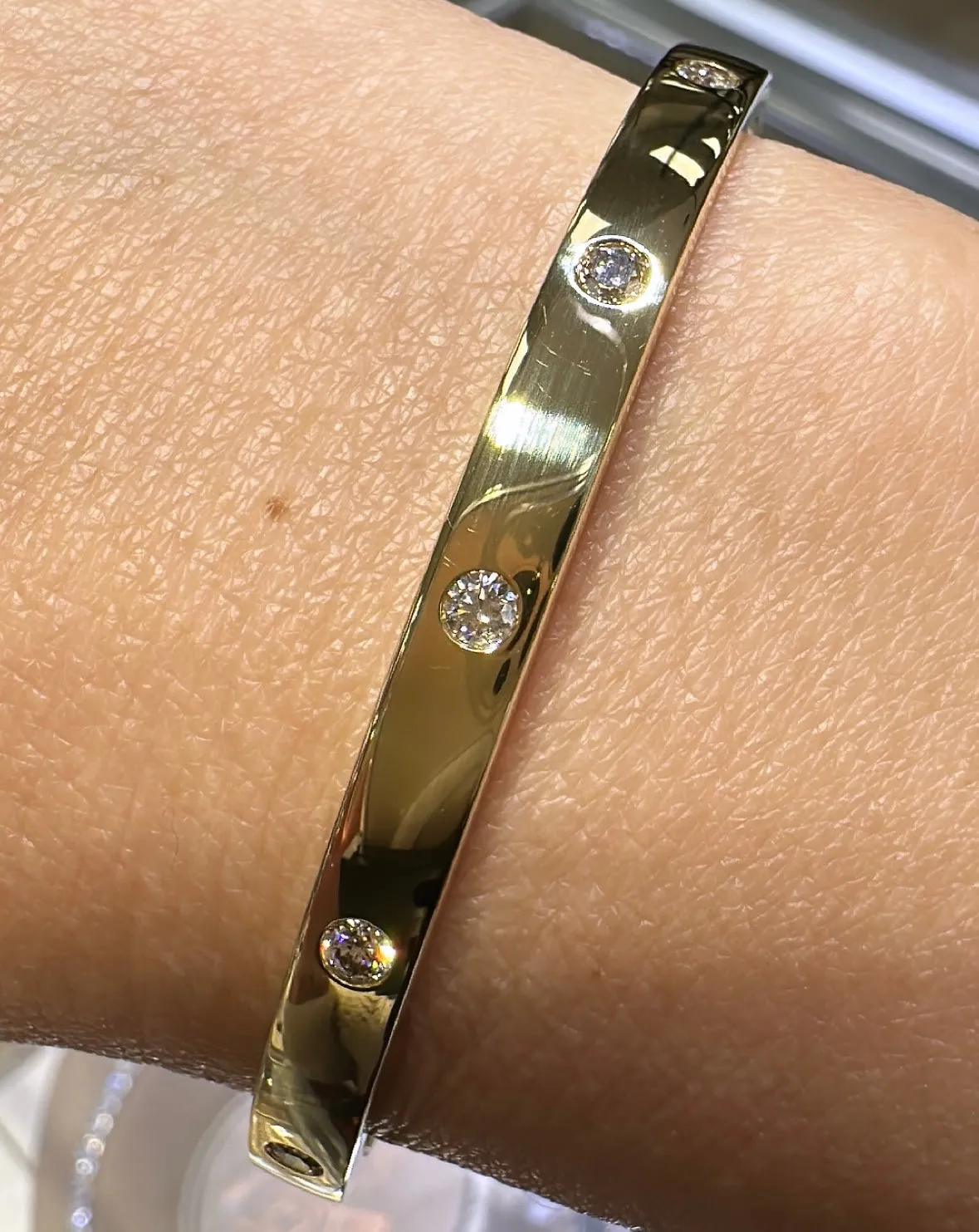 0.46ct tw Burnish Set Diamond Station Bangle Bracelet