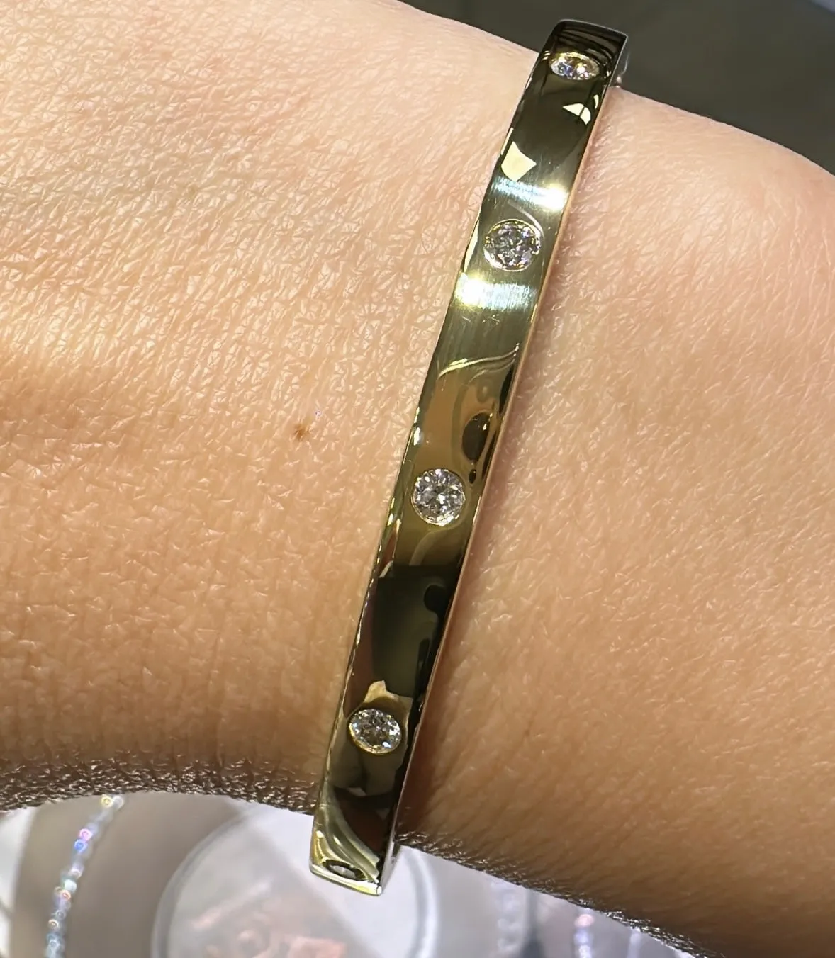 0.46ct tw Burnish Set Diamond Station Bangle Bracelet