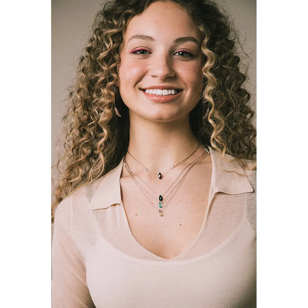 &Livy : Hyevibe Crystal Silk Slider Necklace in Smoked Amber