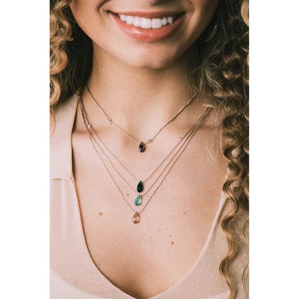 &Livy : Hyevibe Crystal Silk Slider Necklace in Smoked Amber