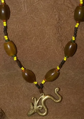 Borneo Tribal Oran Ulu, Dayak, Iban Tribe Heavy Brass Bronze Aso Dog Dragon Earring Talisman, Ear Weight Used as a Pendant for Necklace with Large Amber Beads & Old Glass Trade Beads NB19