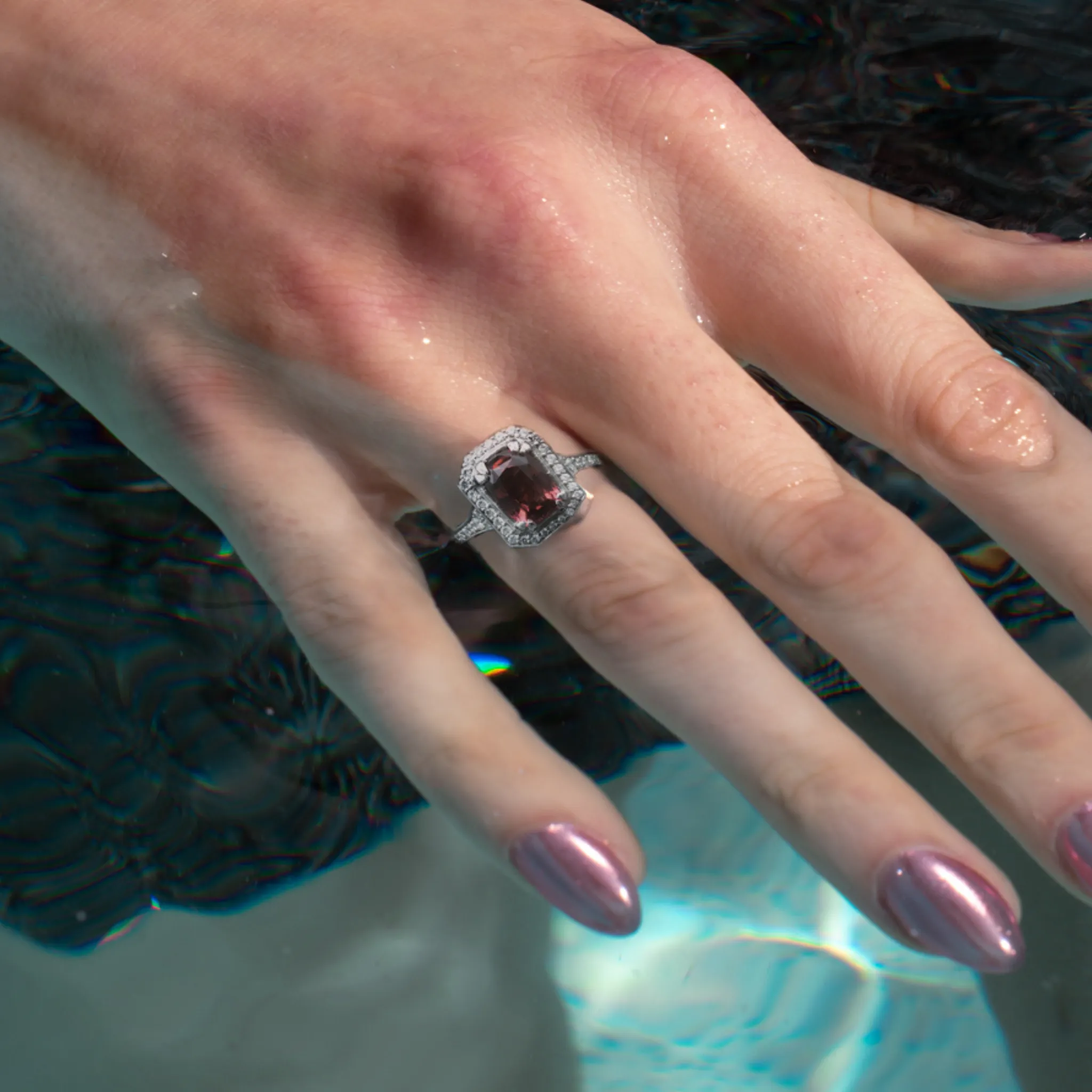 Oval Halo Engagement Ring in Rose Gold