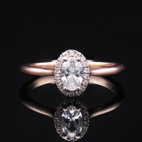 Oval Halo Engagement Ring in Rose Gold