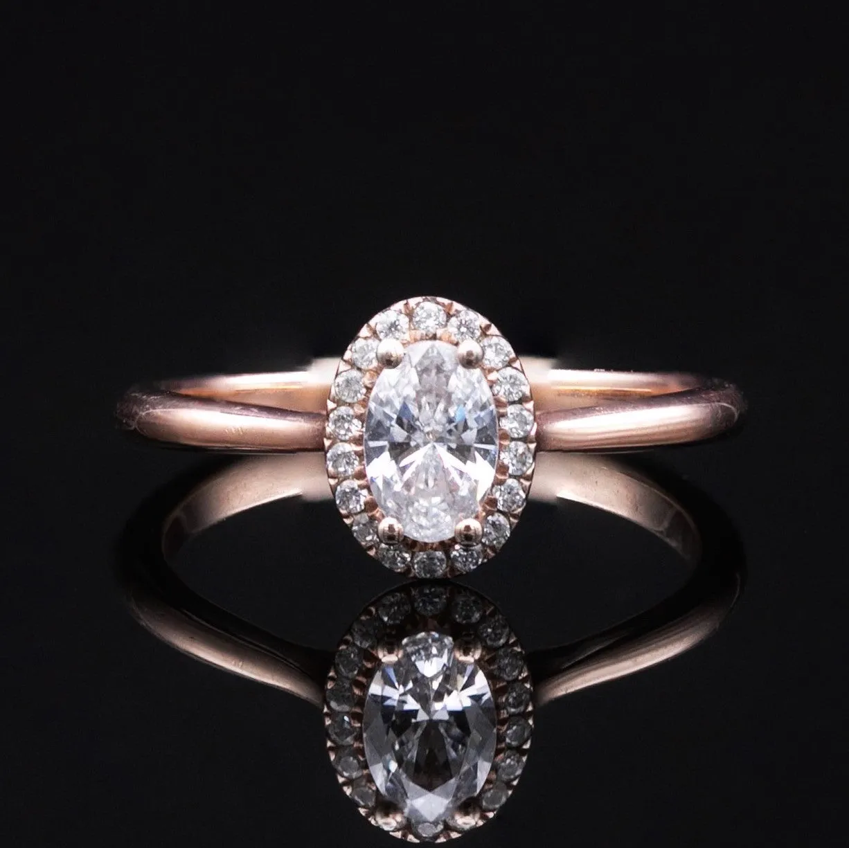 Oval Halo Engagement Ring in Rose Gold