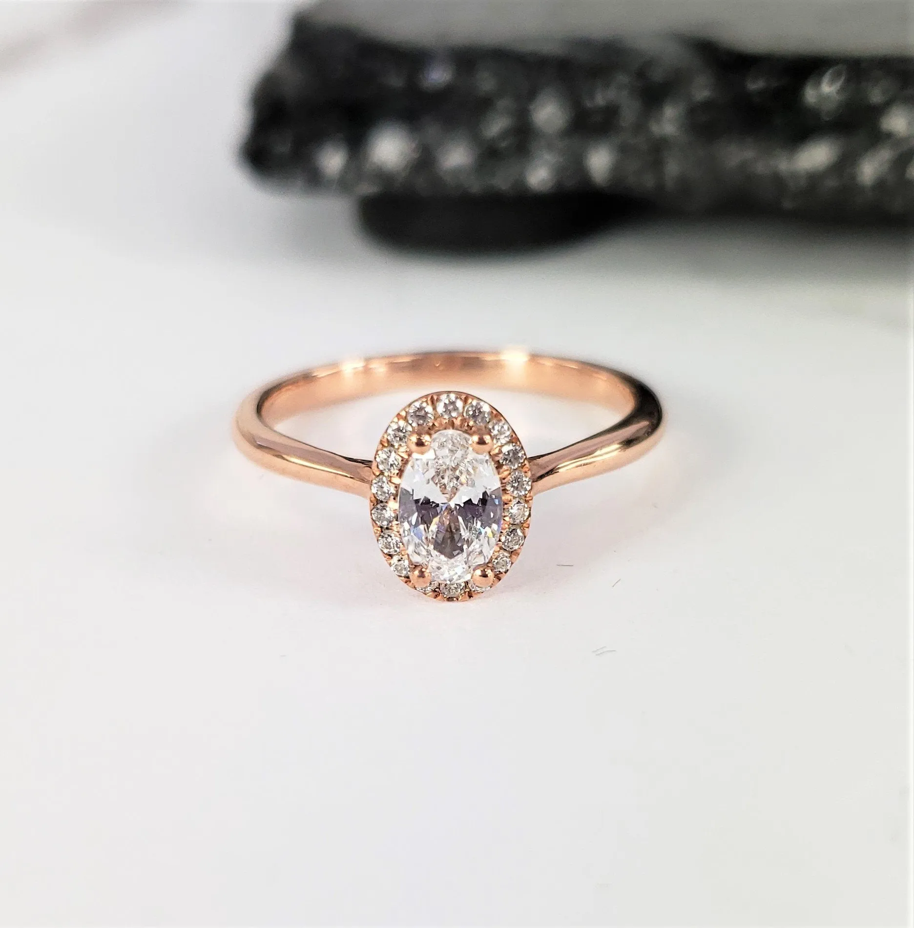 Oval Halo Engagement Ring in Rose Gold