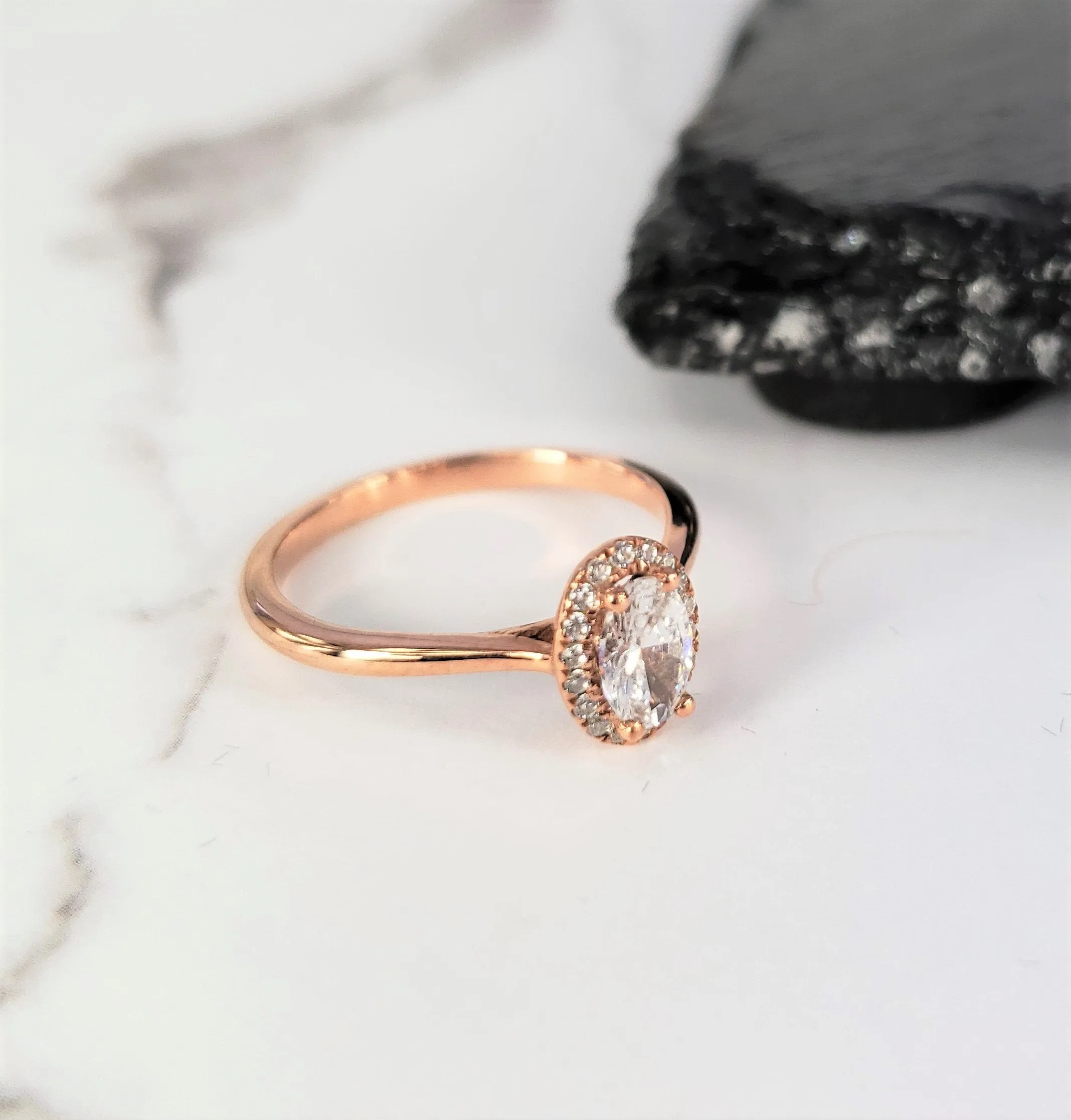 Oval Halo Engagement Ring in Rose Gold
