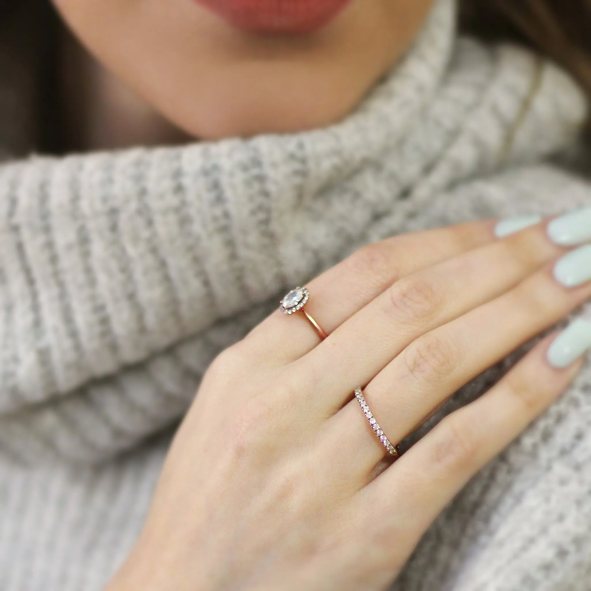 Oval Halo Engagement Ring in Rose Gold