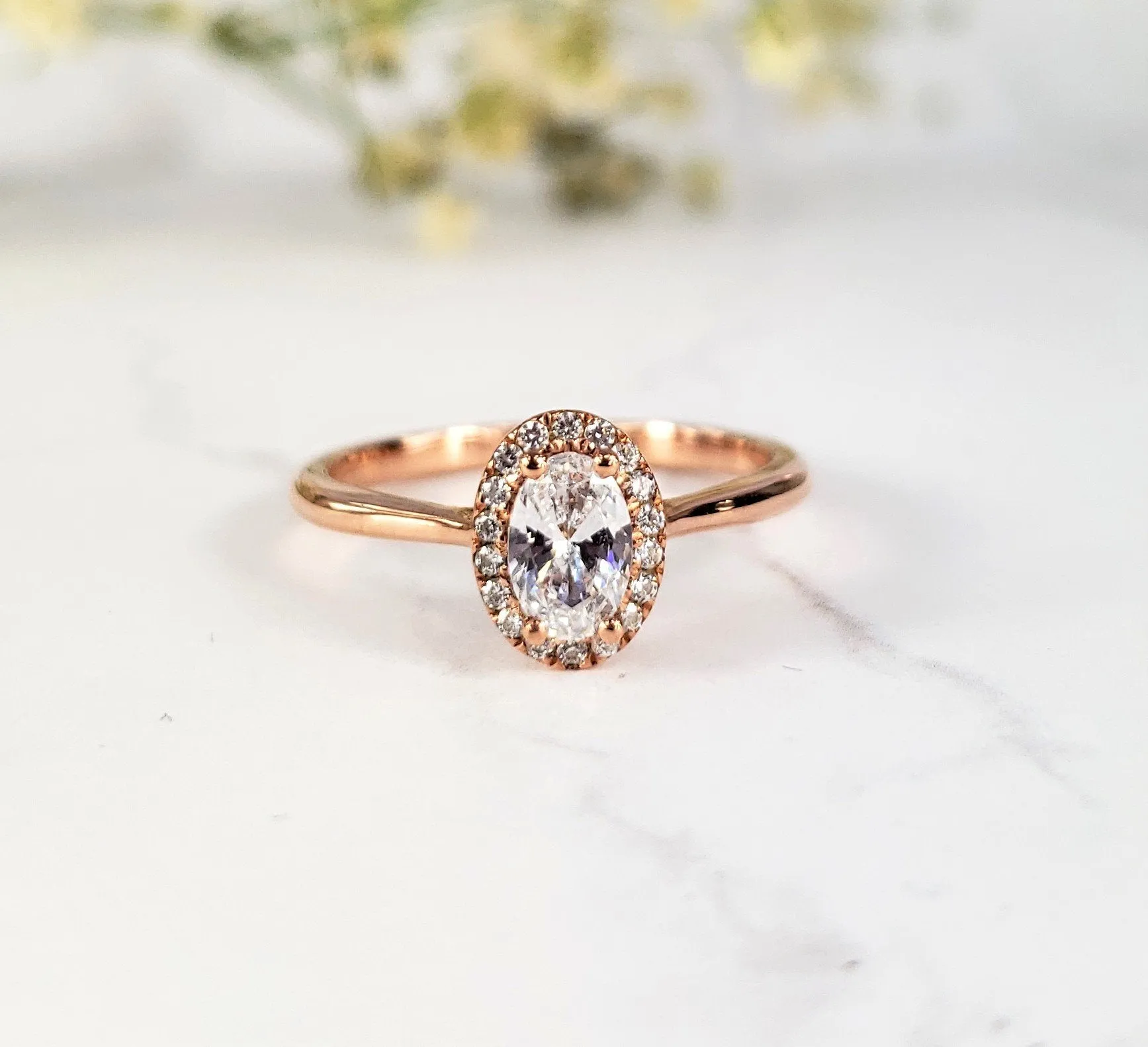 Oval Halo Engagement Ring in Rose Gold