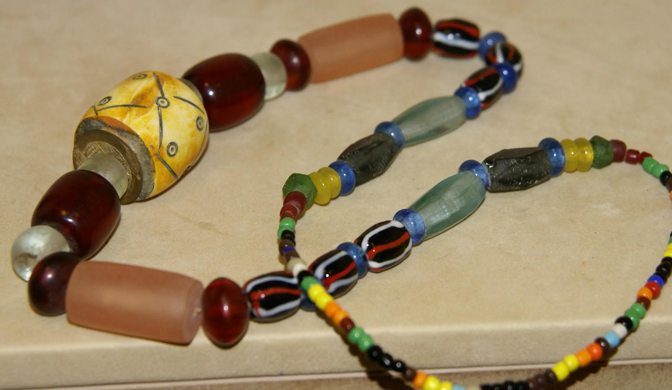 Rare Tribal Ethnic Dayak Iban Tribe Talisman Necklace: Antique Hand Crafted Magical Lukut Sekala , Old Trade Glass Beads, Amber beads, Buffalo Bone Hand Etched Beads, Chinese Coins, collected in 1980’s Borneo Aristocrat Owner, Indonesia. NB5