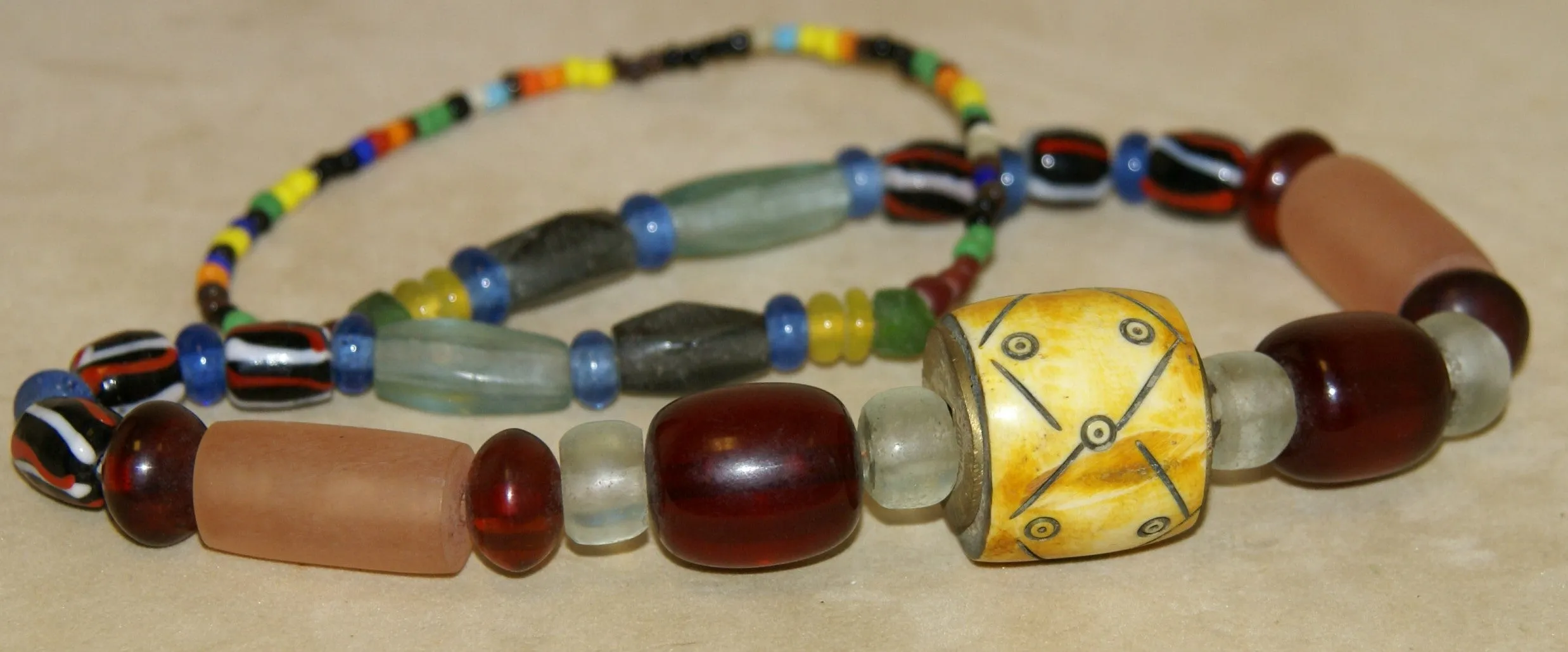 Rare Tribal Ethnic Dayak Iban Tribe Talisman Necklace: Antique Hand Crafted Magical Lukut Sekala , Old Trade Glass Beads, Amber beads, Buffalo Bone Hand Etched Beads, Chinese Coins, collected in 1980’s Borneo Aristocrat Owner, Indonesia. NB5