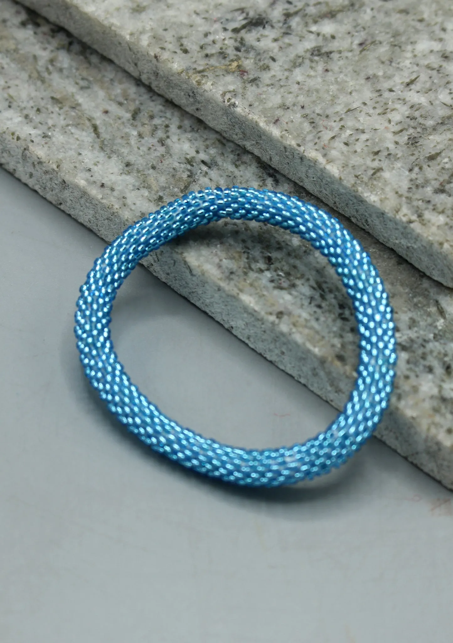 Shiny Blue Beads Nepalese Roll on Bracelet